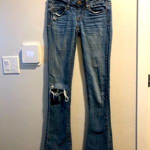 Old school American Eagle low-rise flair jeans with holes!